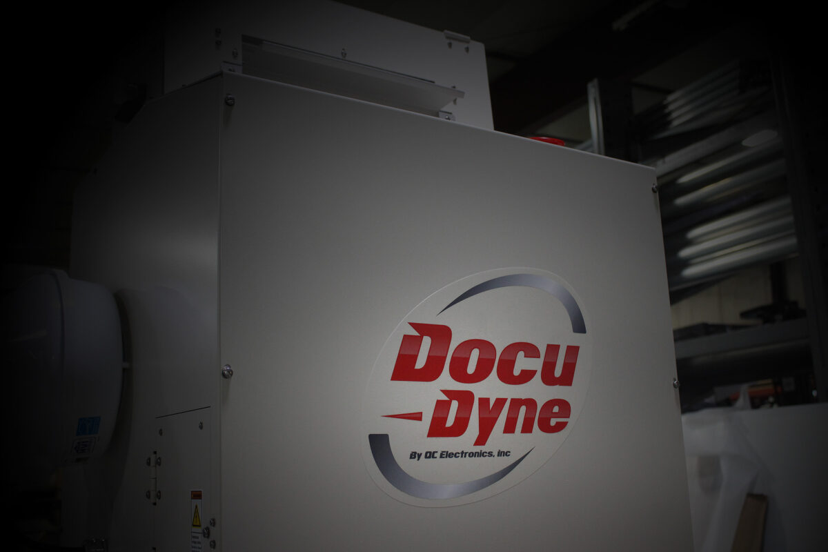 close up image of QC Electronics DocuDyne lab corona treater showing the front panel and DocuDyne logo