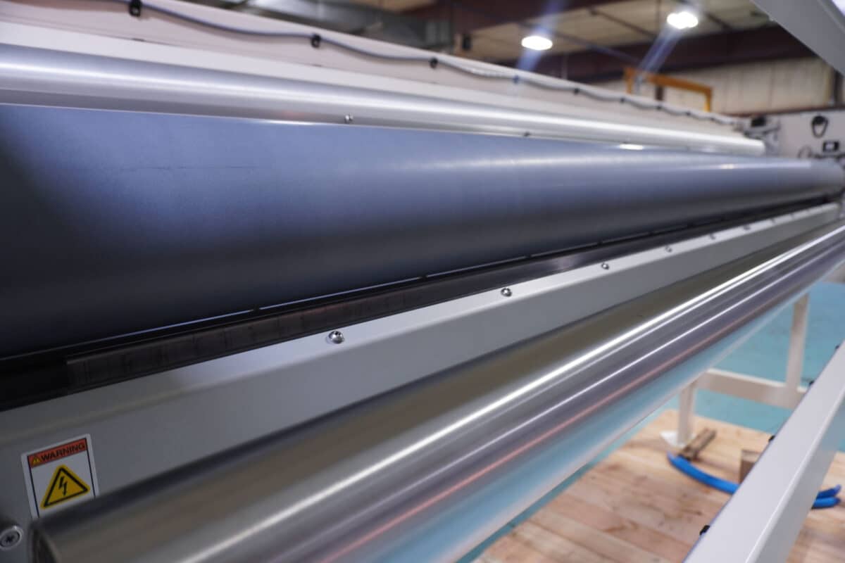 Close up shot of inside of QC Electronics C-Series corona treater for corrugated plastic, palletized for shipment at the Portage, Wisconsin shop floor.