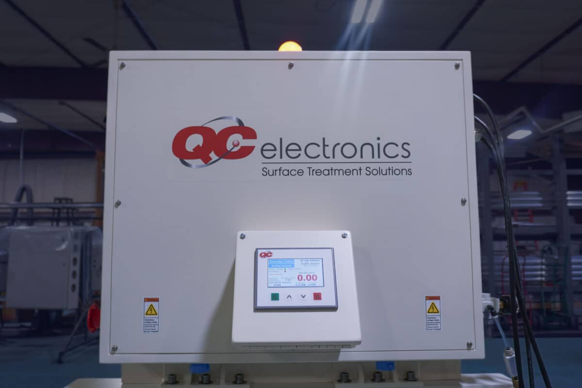 QC Electronics C-Series corona treater for corrugated plastic, palletized for shipment at the Portage, Wisconsin shop floor.